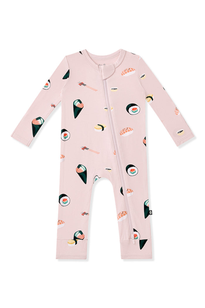 Pink Zippered Romper with Sushi pattern on white background
