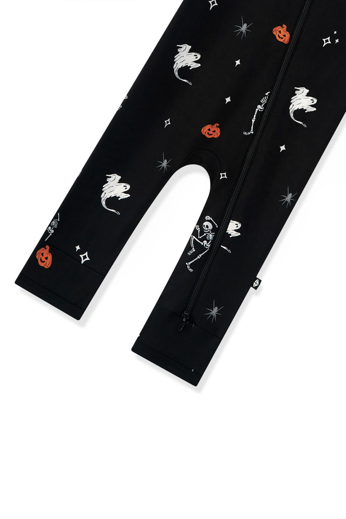 Bottom part of Black Zippered Romper in Halloween Friends print on a white background