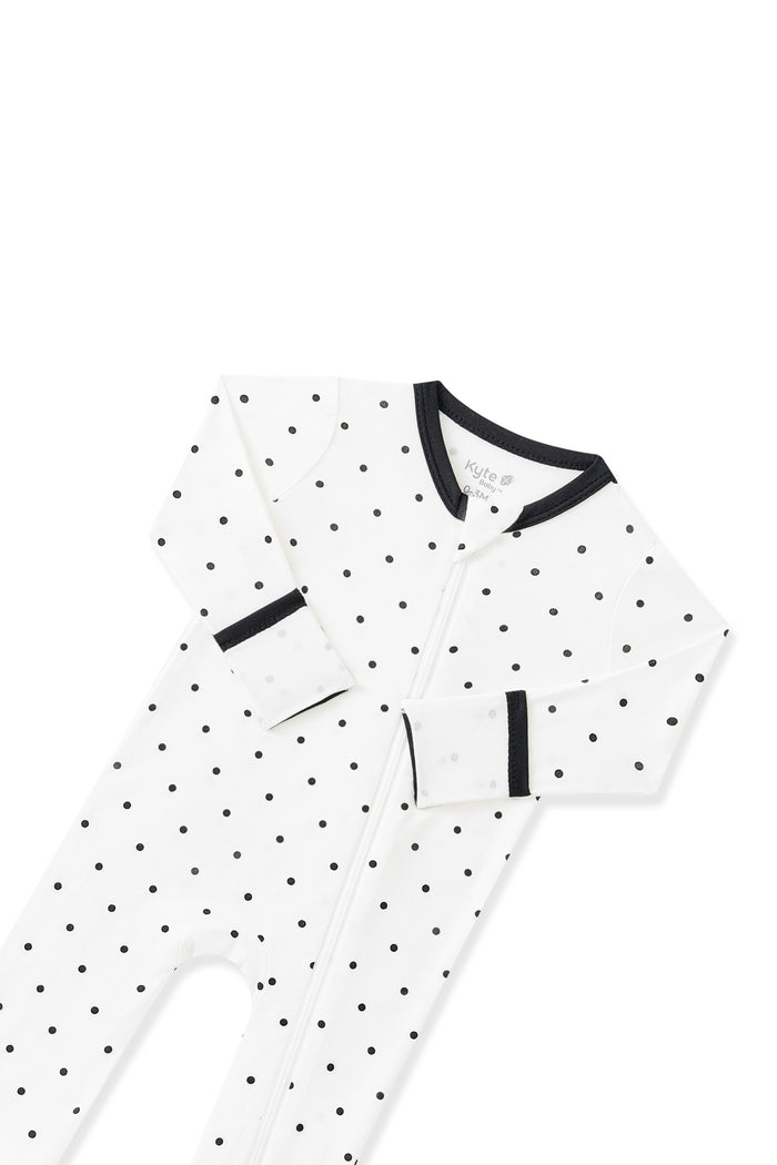 Top part of Zippered Romper in Midnight Polka Dot with black trim on white background