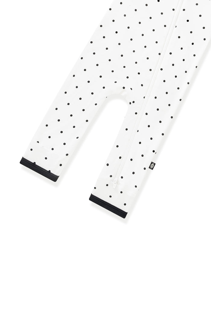 Bottom part of Zippered Romper in Midnight Polka Dot with black trim on white background